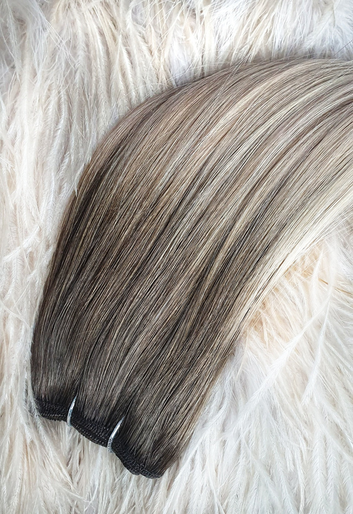 Extensions de cheveux en trame russe